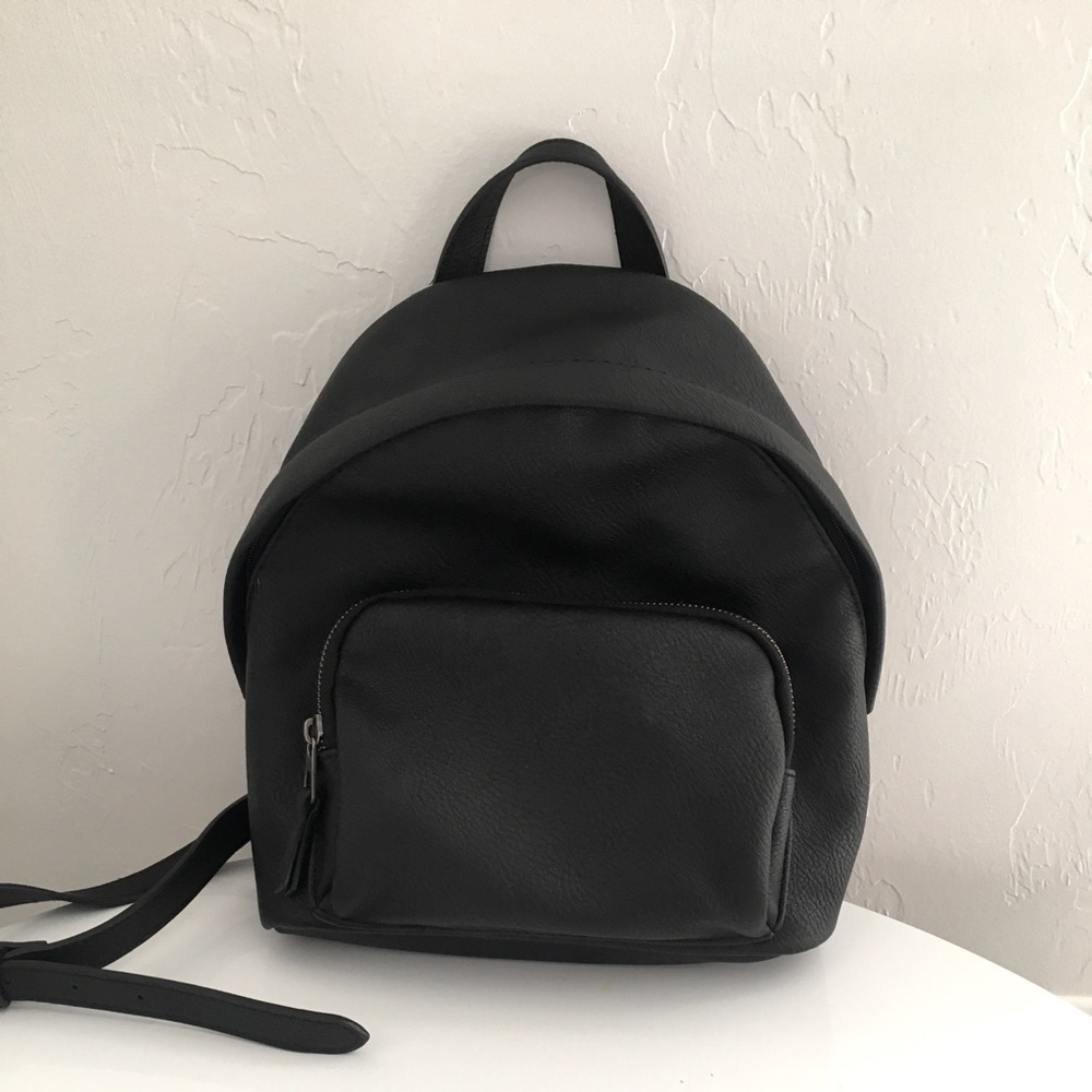 Backpack Purse with outside pocket.